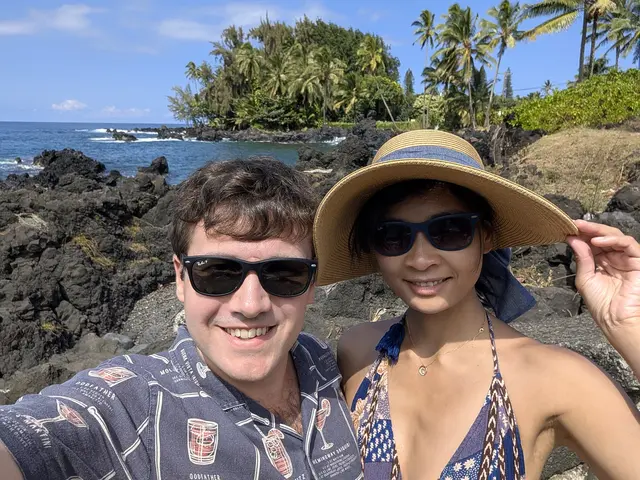Chris and Emily on a beach in Hawaii