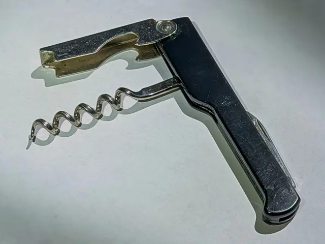 ggraph of a bottle opener on a white background