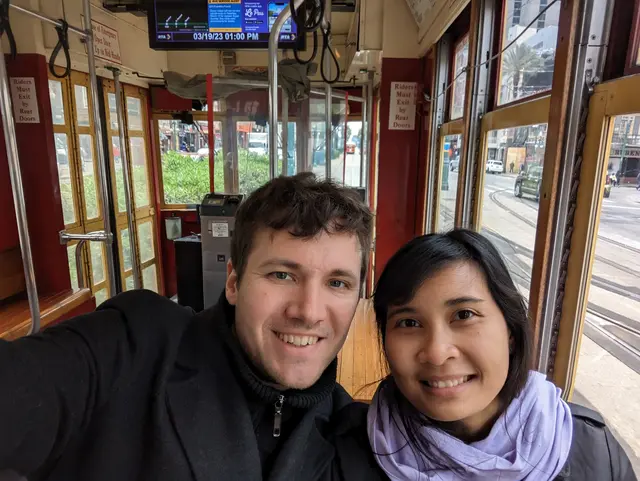 Chris and Emily in a trolly interior